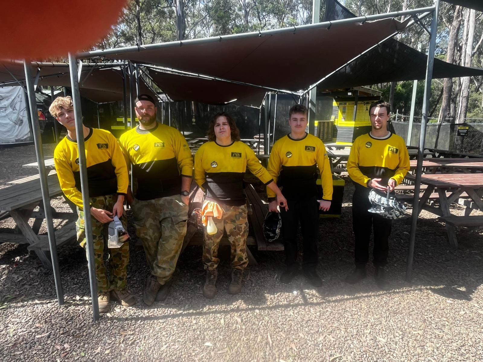 A team of Delta Force marshals wearing yellow uniforms