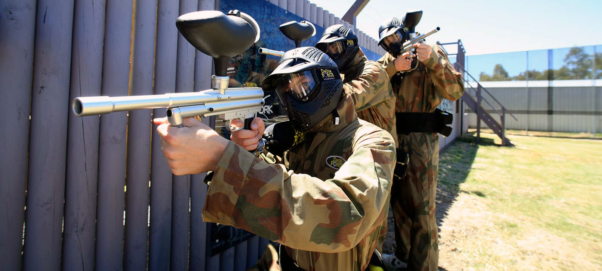 A Delta Force paintball team taking cover